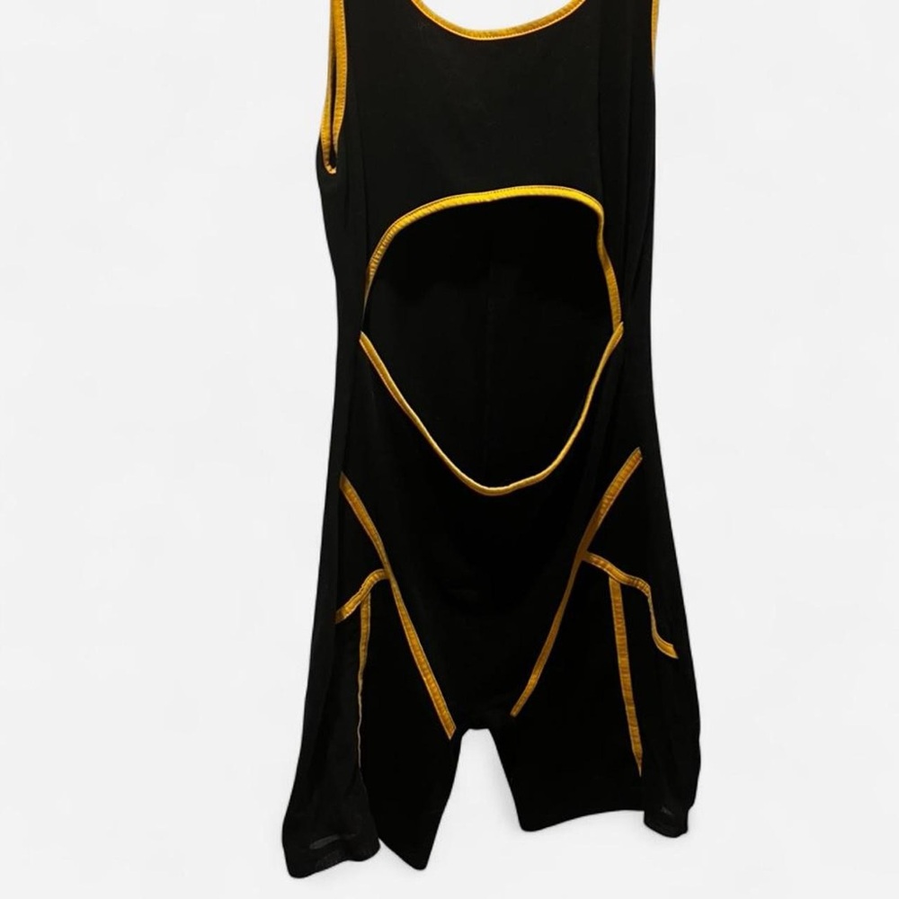 Black and yellow bodysuit with cut out details
